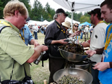 �Best of the Country� lunch - New Brunswick booth: Cliff Morrison, Saint John Ale House, serving some periwinkles, pan fried dulse (Palmaria palmata) in duck fat and IMTA kelp (Saccharina latissima) salad to Steve Johansen, Organic Oceans�s.