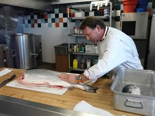 Chef Chris Aerni giving us a demonstration in fish filleting.