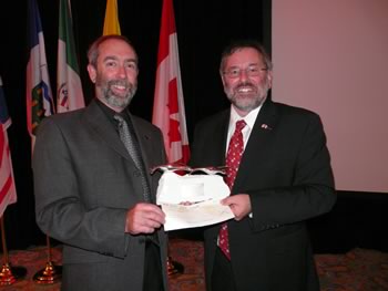 Shawn Robinson and Thierry Chopin with the Synergy Award