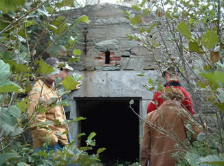 In 2003, the Battery at Red Head was overgrown by alders, raspberry cane, etc., and was difficult to reach.  During the spring of 2005, the NBMHP, along with 4 ESR (Gagetown), the City of Saint John, and John Flood and Sons, cleared the site.  Photo by Kevin Norris 2003(c).
