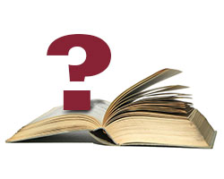 A large, open book yellowed page edges lying flat on a white surface, a few page leafs sticking up. A dark red question mark is floating on one set of pages, as though the point is holding the book open.